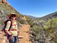 Trekker in the Tanderra Saddle, if you look you can see Lake Torrens. |  Anna Abazovic