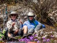 Trekkers taking a drink break on trek. |  Lachlan Gardiner